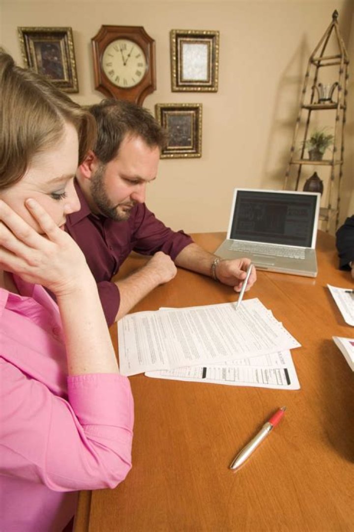 Can a divorced couple still own the house together?