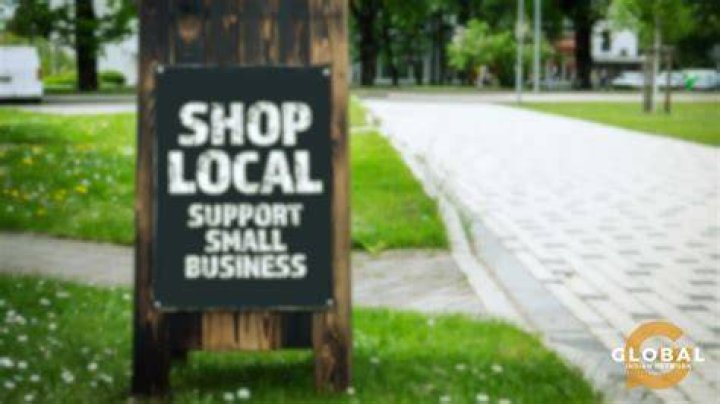 How does supporting local businesses help the economy?