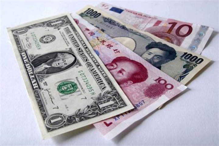 How does the government regulate currency?