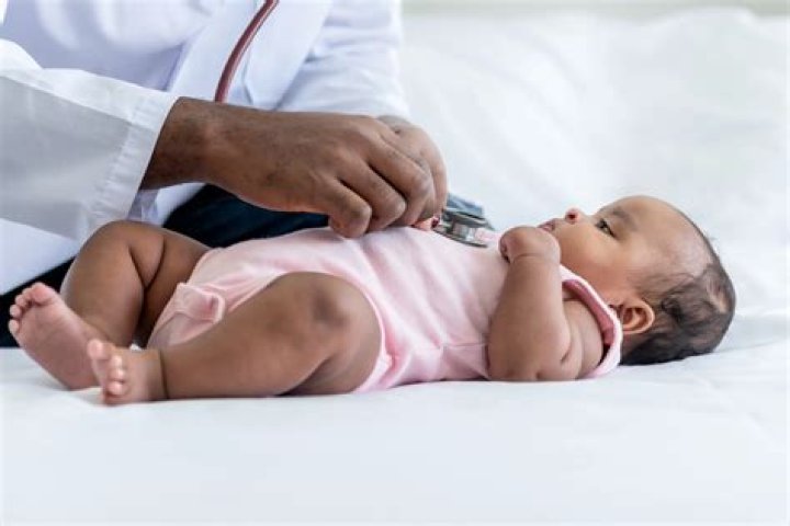 Is it OK for a 3 month old to sit up?