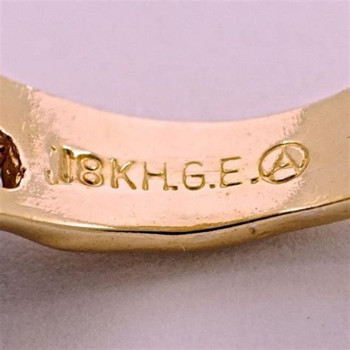 What does 18k HGE with a circled A mean?