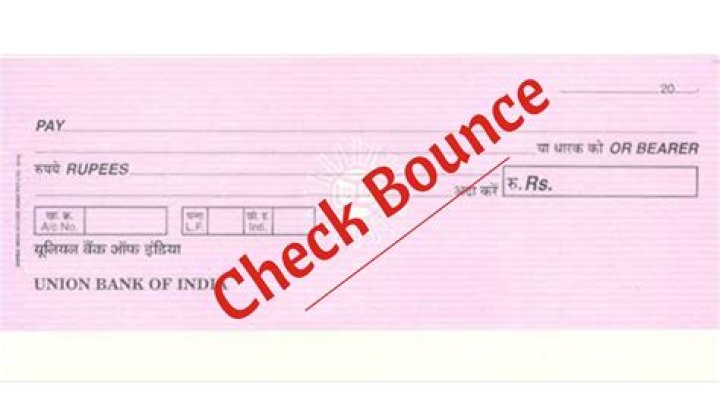 What happens if a business check bounces?