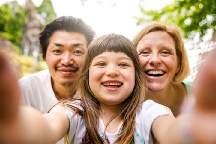 What happens if parents live in different countries?