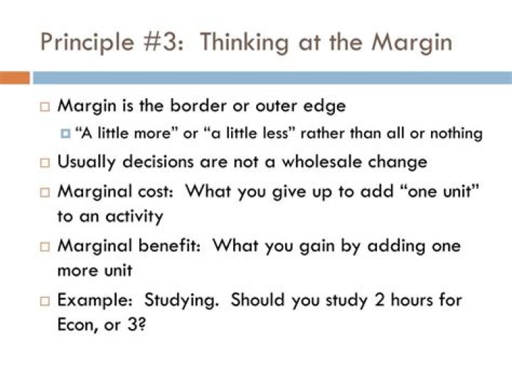 What is an example of thinking at the margin in economics?