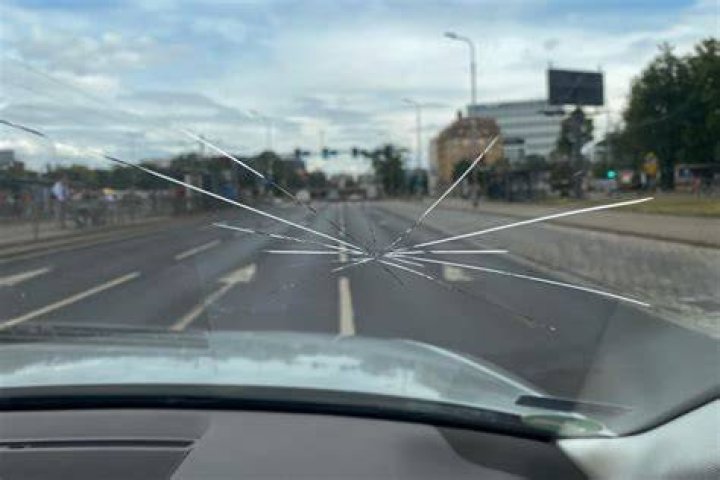 Who is responsible for rock hitting windshield?