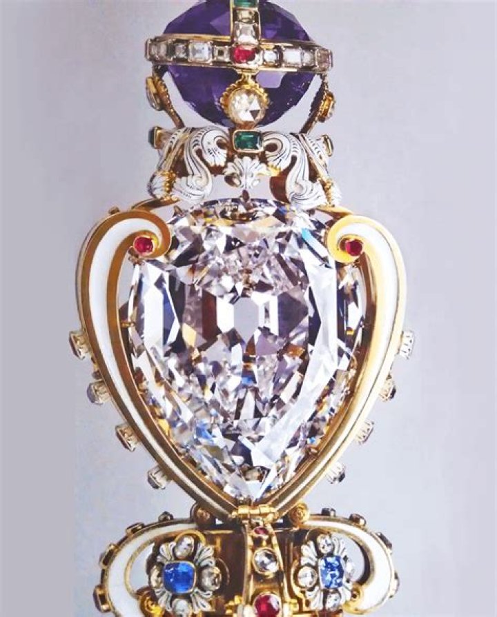 Who owns Alrosa diamonds?